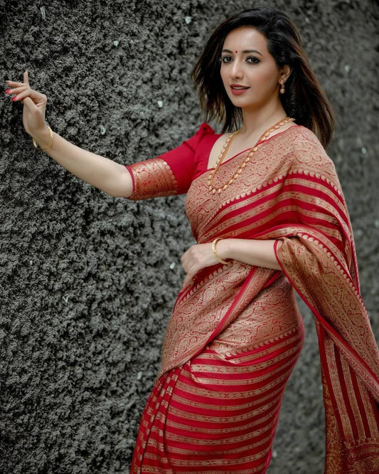 RED PURE SEMI SILK SAREE WEAVED WITH COPPER ZARI COMES WITH ATTACHED BLOUSE.