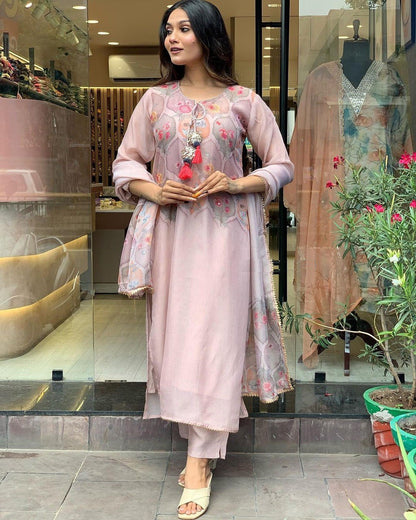 Baby Pink & Peach Color Kurti Suit Set  seems to be a party wear outfit