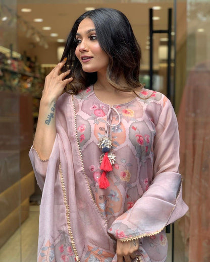 Baby Pink & Peach Color Kurti Suit Set  seems to be a party wear outfit