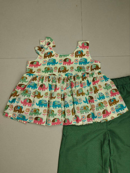 REYON PRINTED HIGH WAIST TOP WITH HAND WORK PEPLUM TOP ATTACHED WITH FRONT BOW WITH COTTON PLAZO PENT