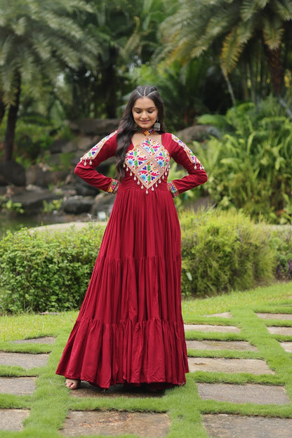 Heavy Flair Inner Cotton Fabric Maroon Gown For Garba