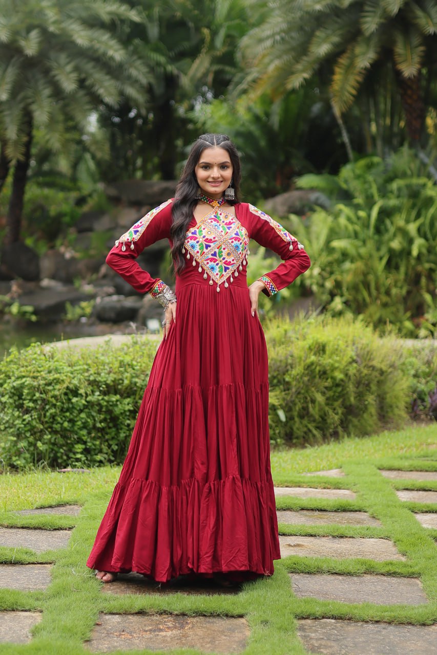 Heavy Flair Inner Cotton Fabric Maroon Gown For Garba