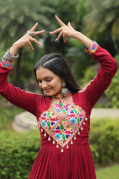 Heavy Flair Inner Cotton Fabric Maroon Gown For Garba