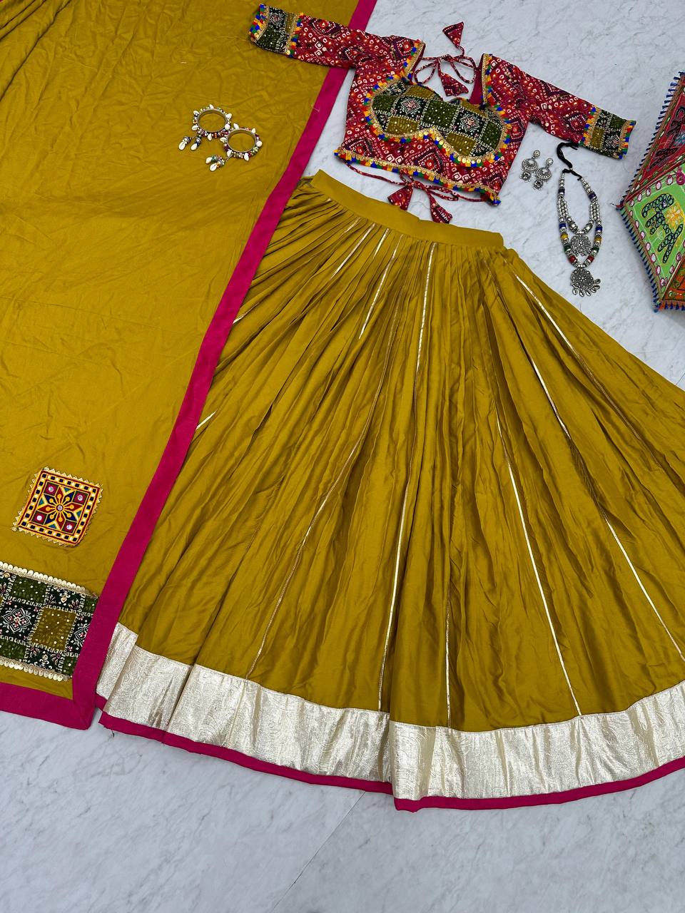 Yellow Lehenga Choli With Bandhani Blouse Design For Garba